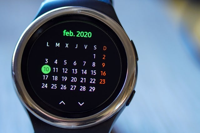 A smartwatch with a hard to read calendar
